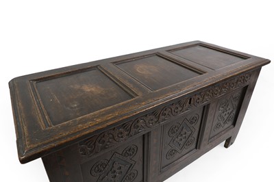 Lot 353 - An oak panelled coffer