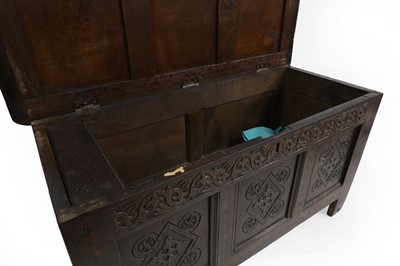 Lot 353 - An oak panelled coffer