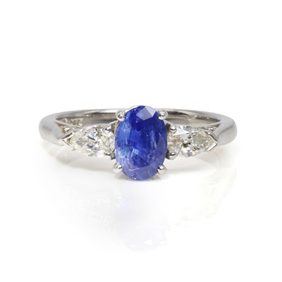 Lot 210 - A platinum Sapphire and diamond three stone ring