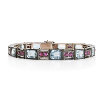 Lot 86 - An aquamarine and ruby line bracelet, c.1950