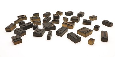 Lot 476 - A large collection of wooden printing blocks