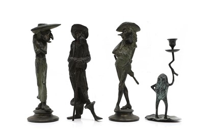 Lot 300 - A pair of figural spelter candlesticks