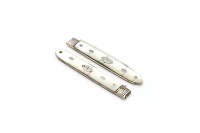 Lot 52 - A pair of Georgian silver and mother of pearl folding fruit knive and forks