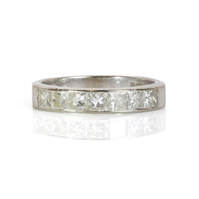 Lot 275 - An 18ct white gold half eternity ring