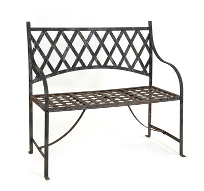 Lot 550 - A wrought iron garden bench