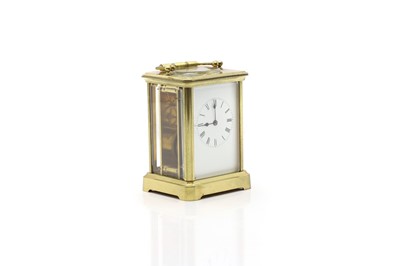 Lot 295 - A French brass cased carriage clock