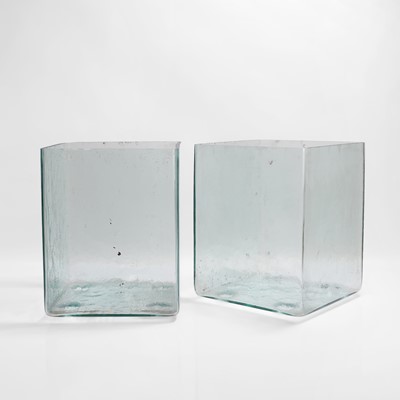Lot 476 - A pair of clear glass battery acid jars
