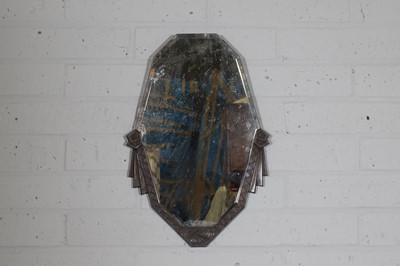 Lot 142 - An Art Deco bronze wall mirror