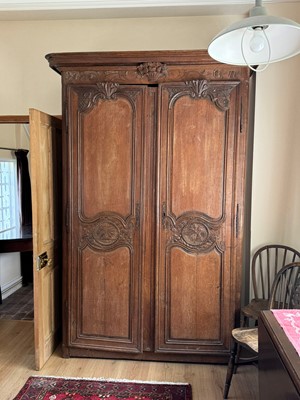 Lot 639 - A French oak armoire