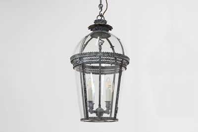 Lot 61 - A glass and pierced metal 'Hyde' hall lantern by Jamb