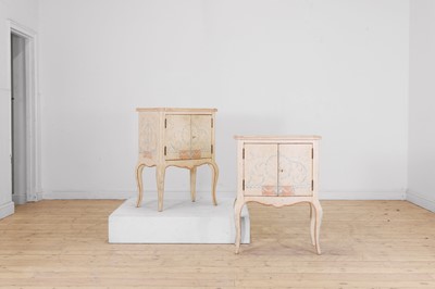 Lot 688 - A pair of painted bedside cabinets