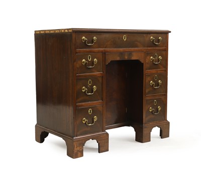 Lot 397 - A George IIII mahogany kneehole desk