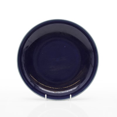 Lot 115 - A Chinese blue-glazed plate