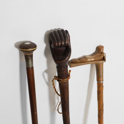 Lot 215 - Three First World War wooden walking sticks