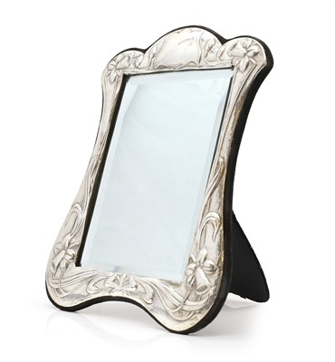 Lot 24 - An Art Nouveau silver easel back mirror