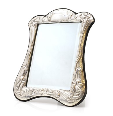 Lot 24 - An Art Nouveau silver easel back mirror