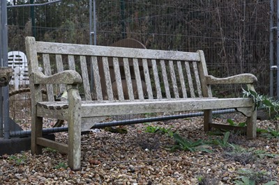 Lot 786 - A large teak garden bench