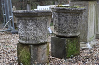 Lot 783 - A pair of reconstituted octagonal planters and stone plinths