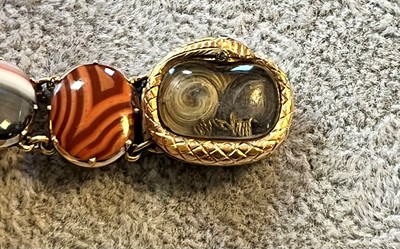 Lot 4 - A Georgian hardstone panel bracelet with a memorial clasp