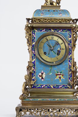 Lot 598 - A gilt-metal-mounted and champlevé enamel mantel clock