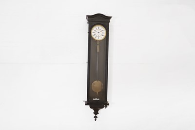 Lot 332 - An ebonised wooden regulator wall clock