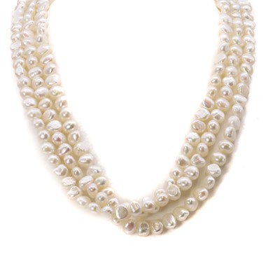 Lot 183 - A uniform three row cultured freshwater pearl necklace