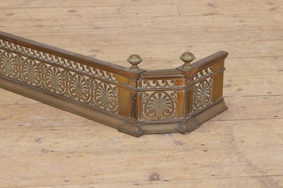 Lot 527 - A pierced brass fender