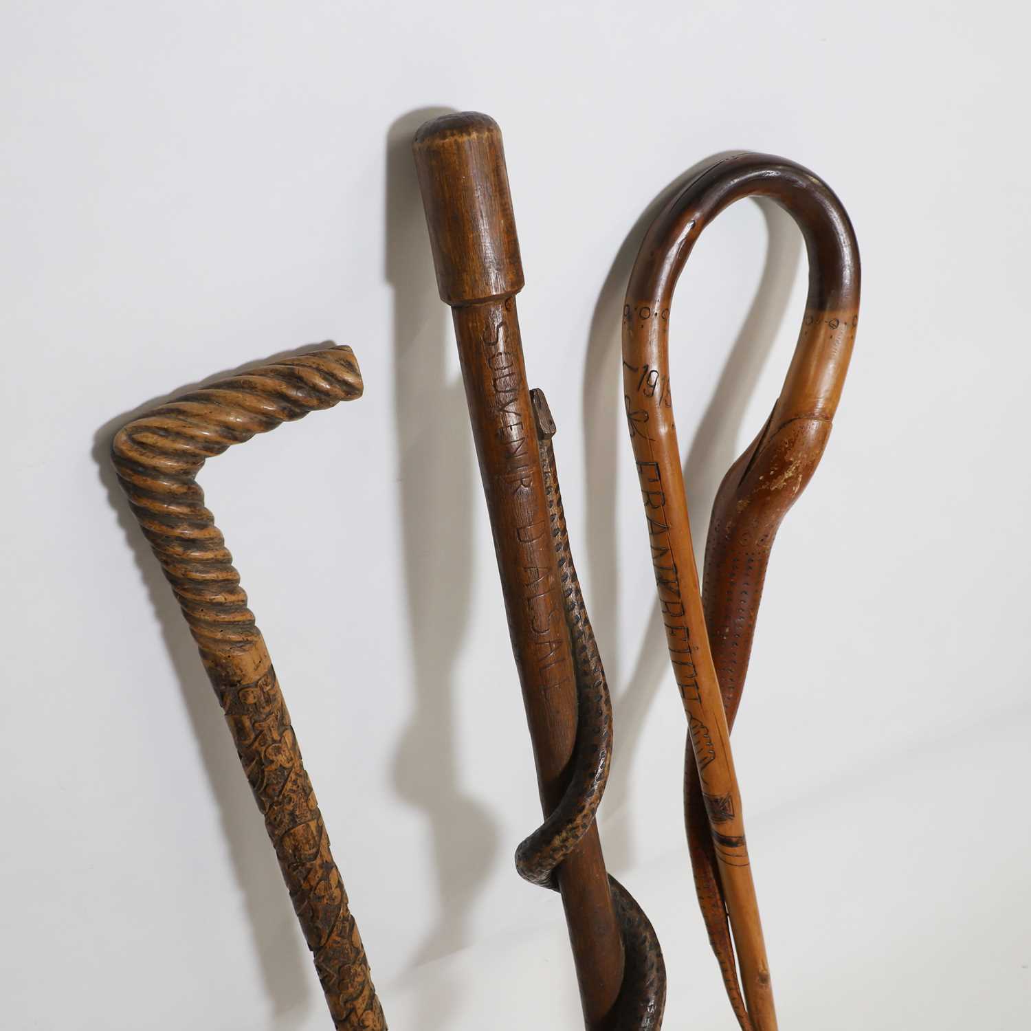 Lot 216 - Three First World War military hand-carved wooden walking sticks