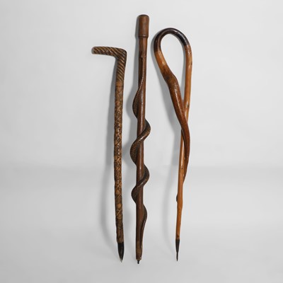 Lot 216 - Three First World War military hand-carved wooden walking sticks