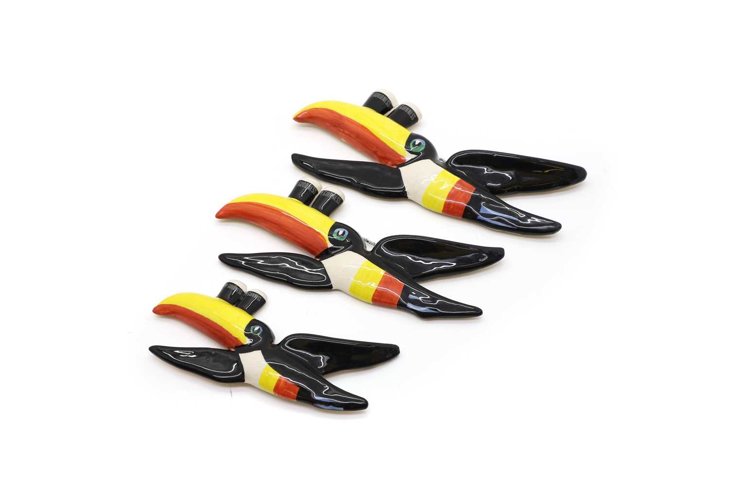 Lot 115 - A set of three Carltonware graduated flying Guinness Toucan wall plaques