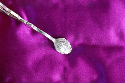 Lot 248 - Two pairs of small silver sugar tongs