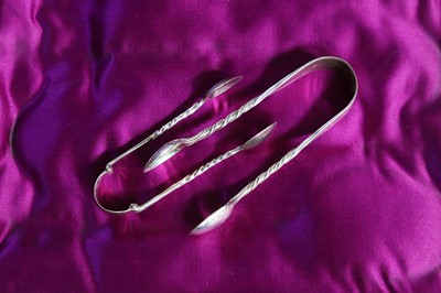 Lot 248 - Two pairs of small silver sugar tongs