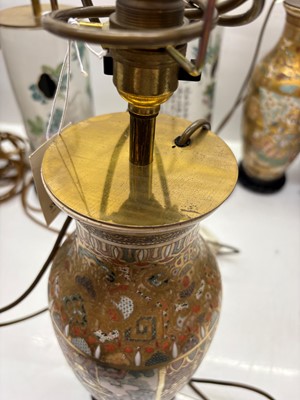 Lot 275 - A pair of Chinese porcelain table lamps