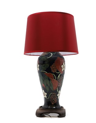 Lot 564 - A Moorcroft pottery table lamp