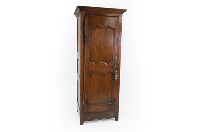 Lot 543 - A fruitwood armoire