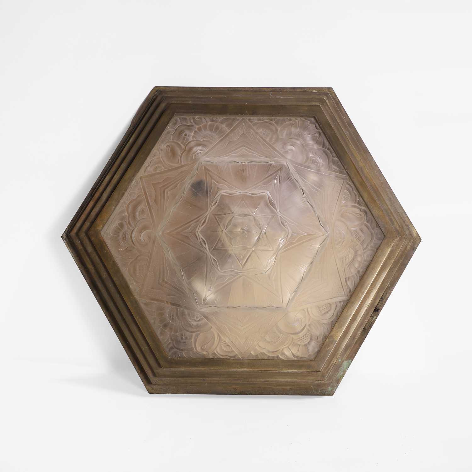 Lot 153 - An Art Deco moulded glass and bronze wall light