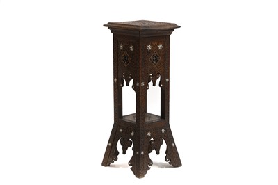 Lot 340 - A Syrian carved hardwood jardinière stand