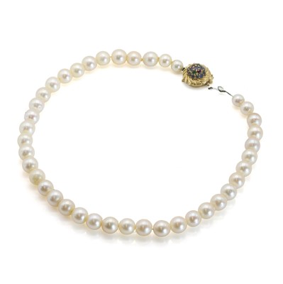 Lot 230 - A single row cultured pearl necklace with a varicoloured gemstone clasp