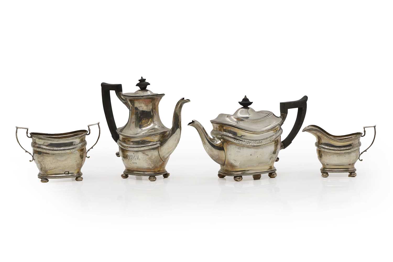 Lot 62 - A silver four piece tea service