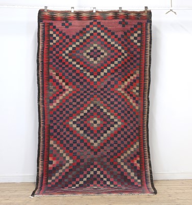 Lot 285 - A geometric rug