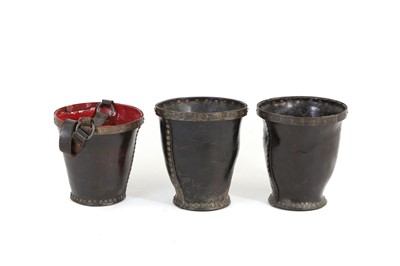 Lot 331 - Three Georgian leather fire buckets