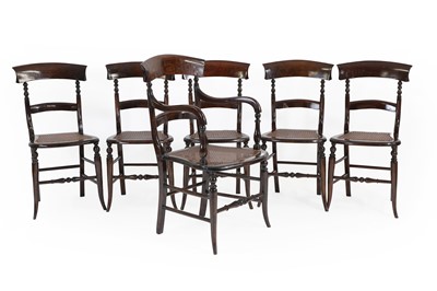 Lot 512 - A set of six beech and cane chairs