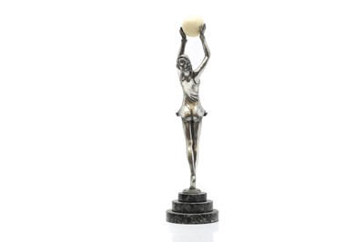 Lot 303 - An Art Deco metalware figure