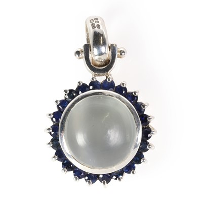 Lot 163 - A silver moonstone and sapphire cluster pendant