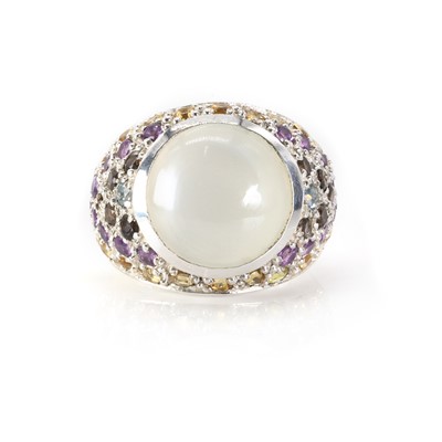 Lot 1221 - A silver moonstone and multi gemstone bombé ring