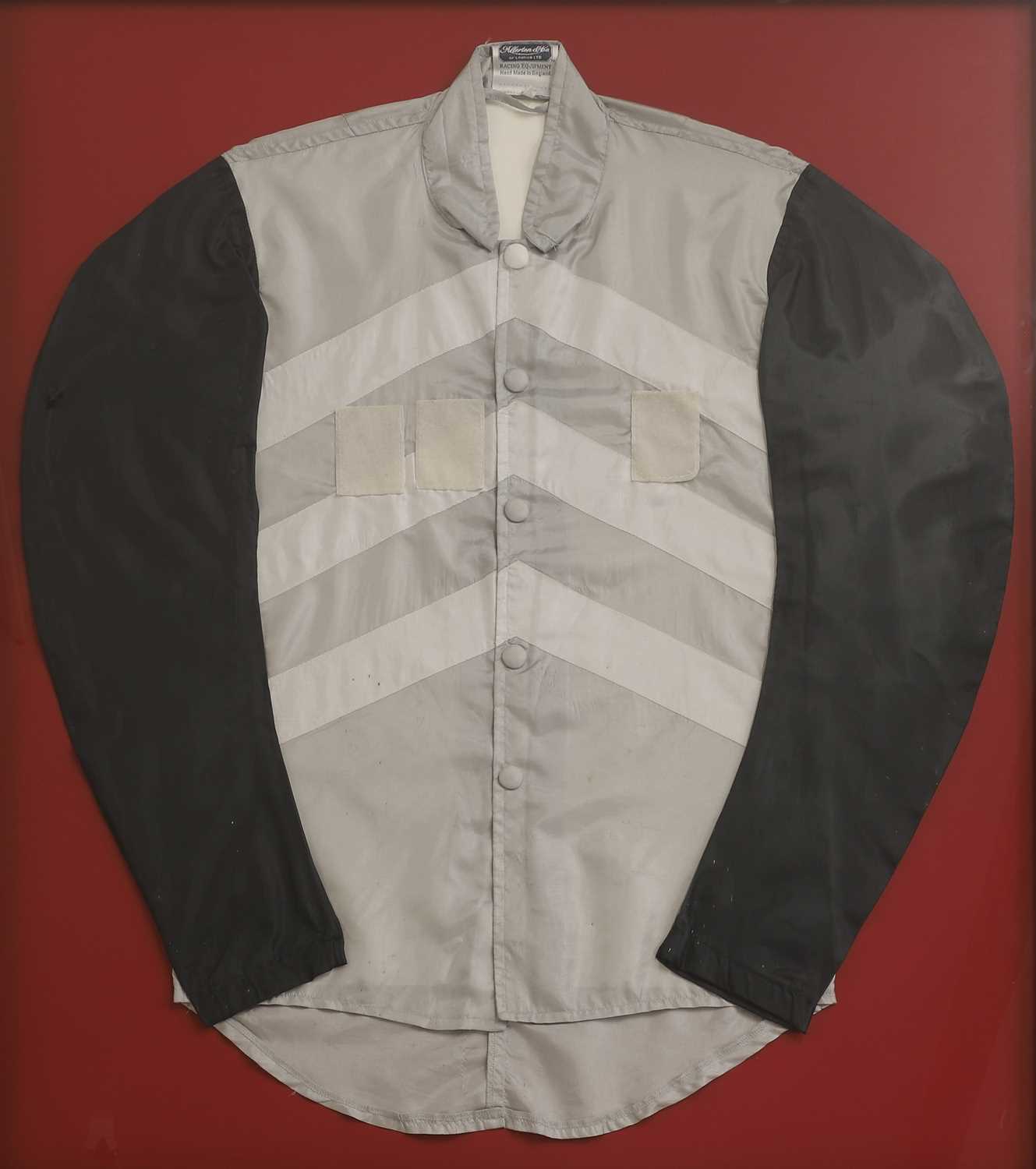 Lot 375 - A framed jockey racing silk