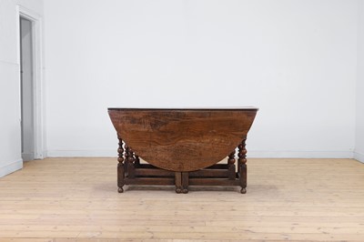 Lot 252 - A Charles II oak drop-leaf table