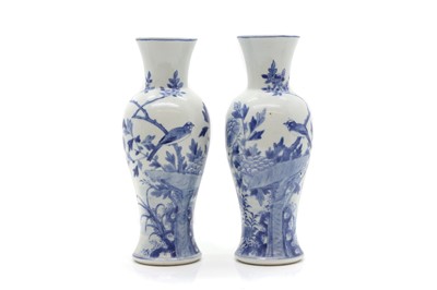 Lot 240 - A pair of Chinese blue and white vases