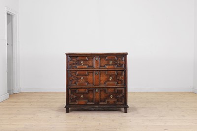 Lot 690 - An oak chest of drawers