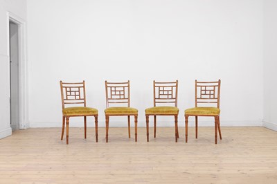 Lot 454 - A set of four Victorian Aesthetic period satinwood side chairs by Howard & Sons